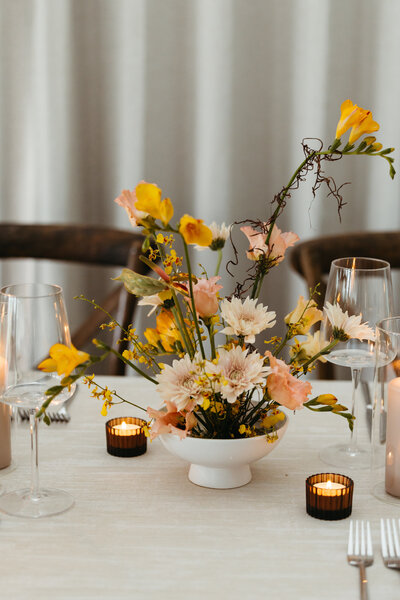 Bride and groom kissing in an elevator