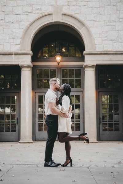 man and woman kissing