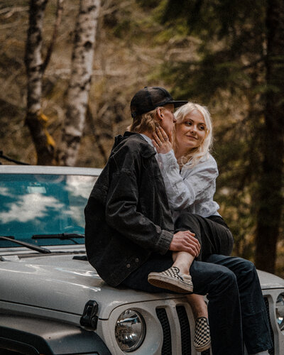 engagement photoshoot in the woods with a jeep