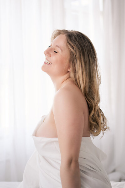 romantic boudoir photo of blonde model 