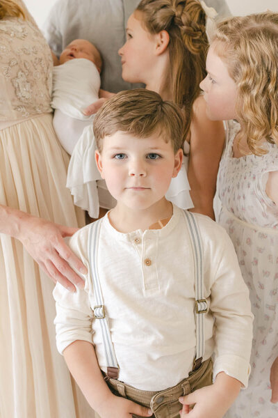 little boy is the focus of this family photographer image in omaha nebraska