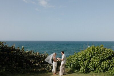 Candid oceanfront wedding moment by photographer San Juan Puerto Rico


