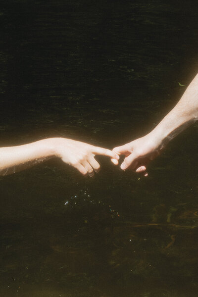 couple embracing on beach in australia