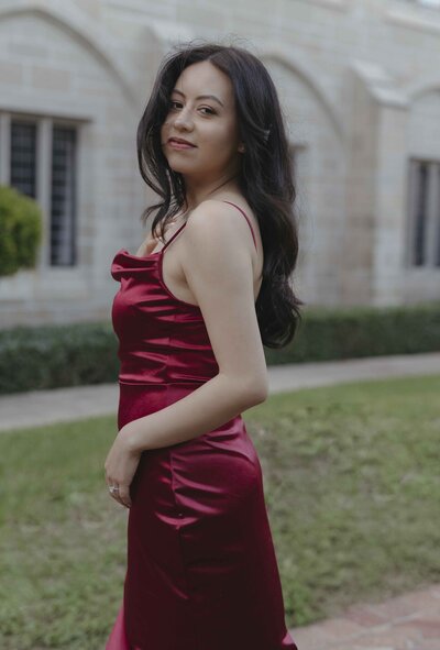 Woman wearing red dress smiling
