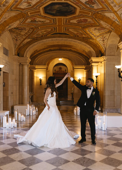 Couple dancing at Aldrich mansion in newport Rhode Island with checkered floor captured by Rhode Island Wedding Photographer, Sincerely Liz
