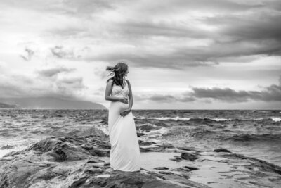 Black and white image of pregnant woman photographed my Portland maternity photographer.