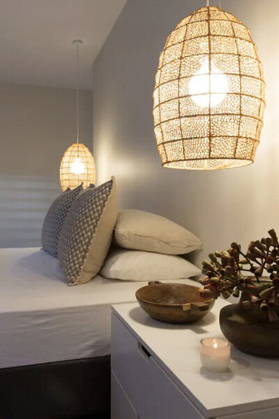 King bed with cane lampshades