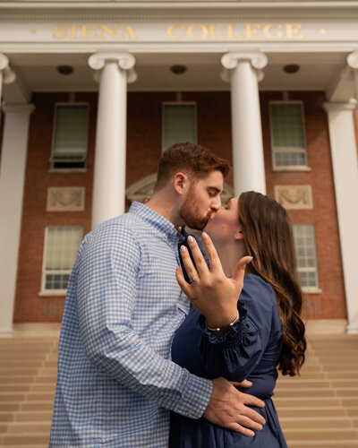 Showing off the ring after her Siena College proposal.