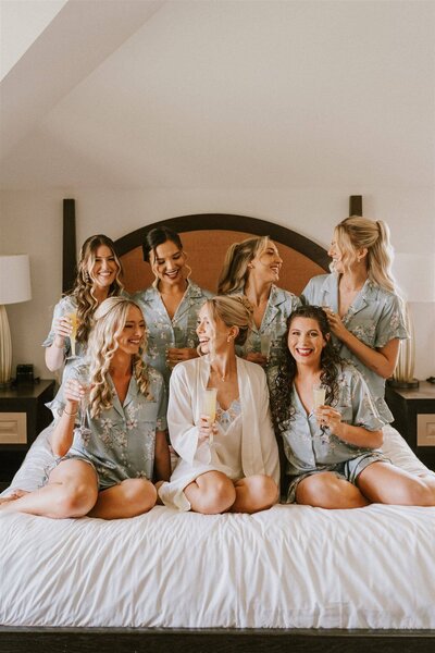 Bridal party styled with all curls and waves — fun, modern bridesmaid looks created by Klover Beauty for a Maryland wedding.