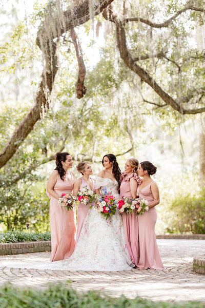 Tallahassee bride standing with her bridesmaids. 
