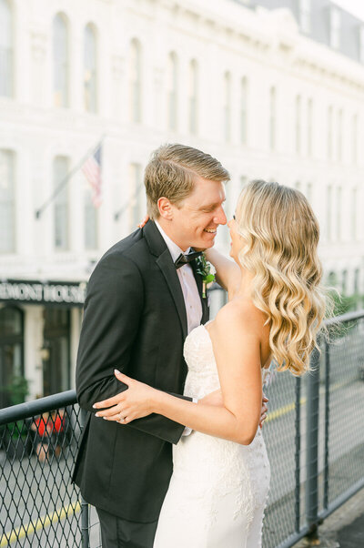 bride and groom on the roof of the tremont house in galveston