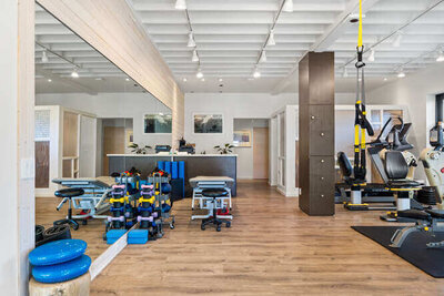 Spacious PT room for strength, mobility, and injury recovery sessions