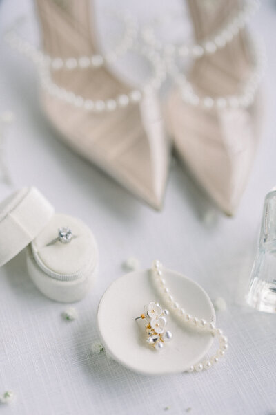 Bridal shoes, ring, jewlery details flatlay