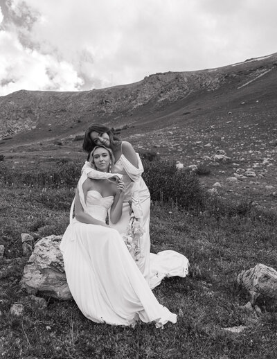 LGBTQ+ couple hugging at Colorado elopement 