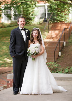 Bride and groom walk up memorial steps at their DC wedding