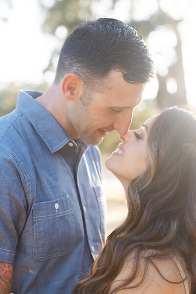 couple kissing during golden hour