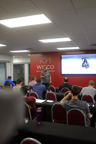 Person giving presentation to a group of people