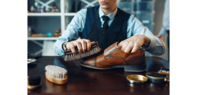 men's shoe repair, polishing and restoring old shoes to it's original condition