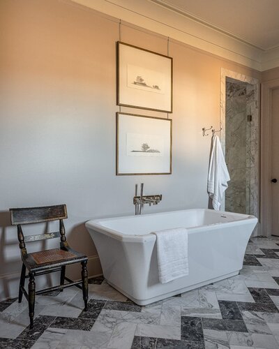 Minimal Clean formal bathroom large tub interior design memphis 