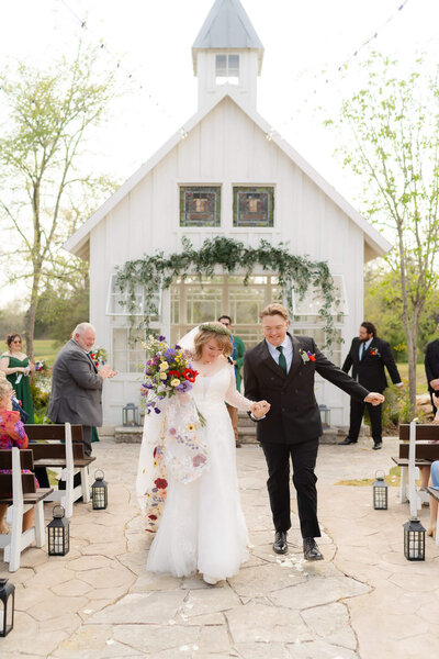 couple in wedding chapel sharing a quiet moment