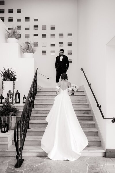 Bride walking up the stairs to the Groom at the Four Seasons Scottsdale