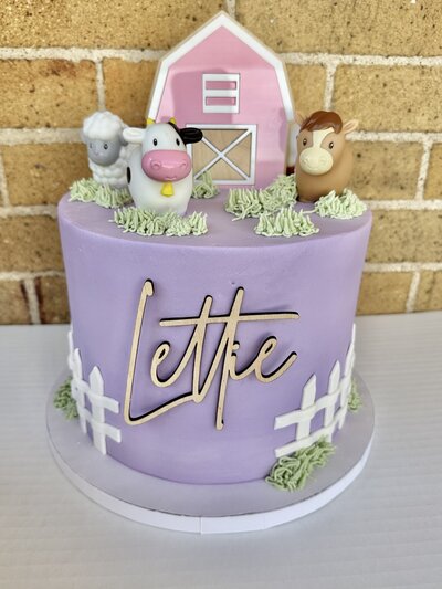Fun and colorful kids' cake from Icing on the Cake Bakery, designed with playful decorations and delicious frosting for a perfect celebration.