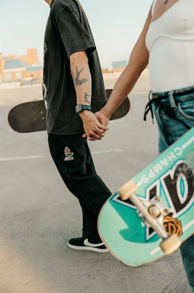 Skateboard Couple Holding Hands