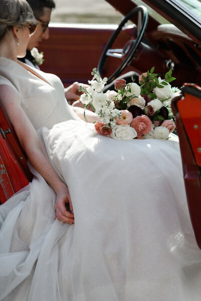 photo of bride looking at groom during speeches on wedding day