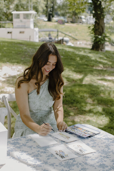 Sloan painting some wedding guests