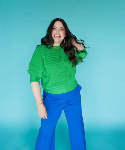 heather crabtree smiling in green sweater