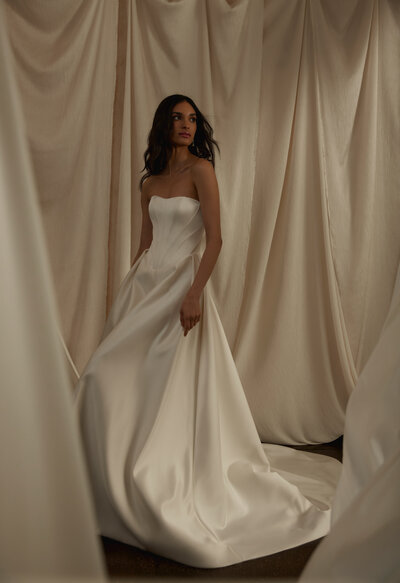 corseted seams, basque waistline, satin