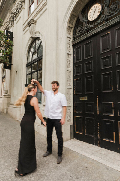 Black and white image of couple at engagement shoot