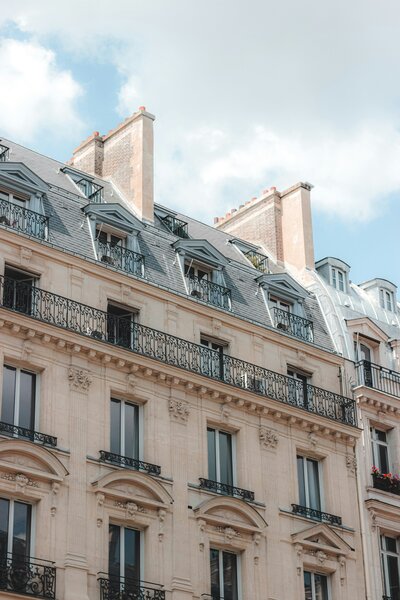 Charming historic building with balconies in Paris, France