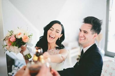 Bride and groom celebrating at Saddlerock Ranch and Vineyard