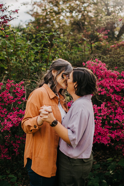 happy-engaged-couple-embracing-in-garden-kelly-kaz-upstate-new-york-photographer-buffalo-beyond