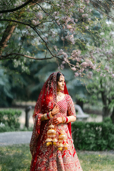 Sunset image of bride and groom walking shot by Alberta Wedding Photographer Revel Photography