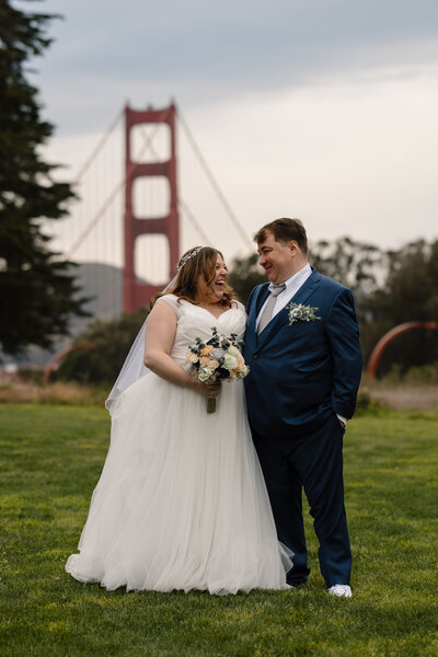 bride and groom in a forest during their elopement
