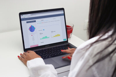 Laptop displaying neurofeedback therapy session data