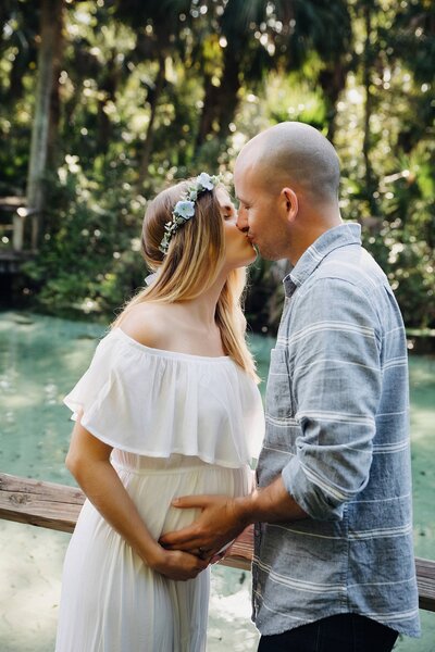 A serene maternity photoshoot in Orlando, Florida, capturing the beauty of motherhood in a picturesque setting.