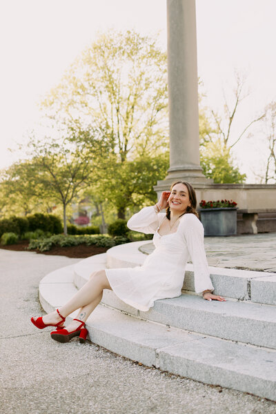 College graduate having portraits taken to commemorate graduating college