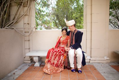 Multicultural couple getting married at Natural History Museum in Balboa Park San Diego Wedding Venue