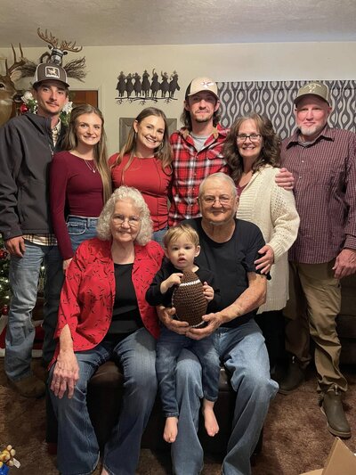 Ray and Ann Hodge with their son, Ryan, and his wife, children, and grandchild.