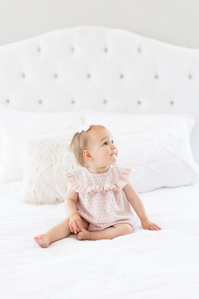 Baby girl sitting in boise photography studio,