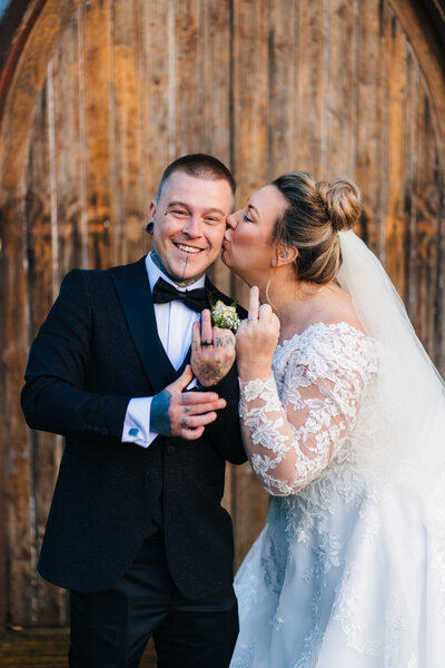 Couple showing off their wedding rings at AShfield House