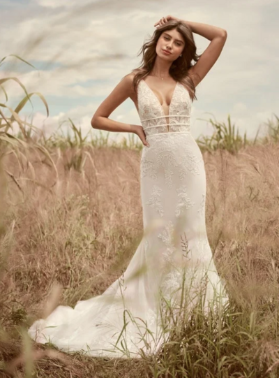 Keyhole Back Boho Sheath Wedding Gown. If you've got your heart set on boho, we can't help but steer you in the direction of gorgeous florals and a slinky-chic silhouette. For your consideration: this backless V-neck sheath wedding gown in nature-inspired perfection.