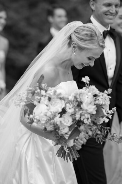 Bride and groom walk up memorial steps at their DC wedding