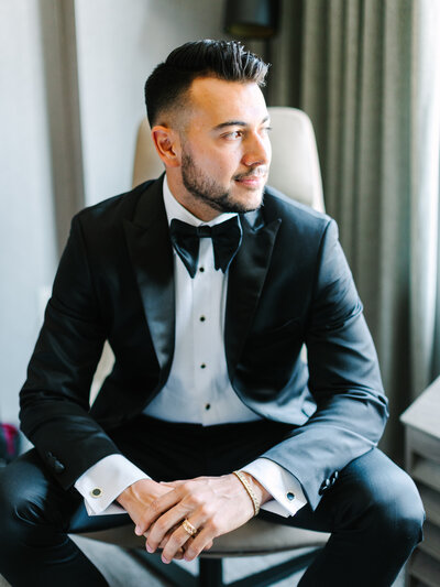 Groom portrait while getting ready for wedding