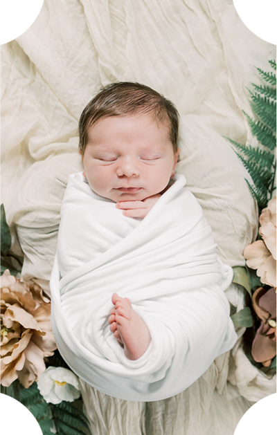 newborn baby girl during her Philadelphia in-home newborn session with Samantha Jay Photography  swaddled and sleeping
