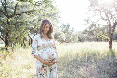 Austin Family Photographer, Tiffany Chapman Photography expecting mother holding belly photo