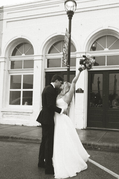 Bride and groom kissing and celebrating after their ceremony designed and planned by Everlasting Events Texas